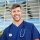 smiling-male-healthcare-worker-outside-hospital-resized.jpg